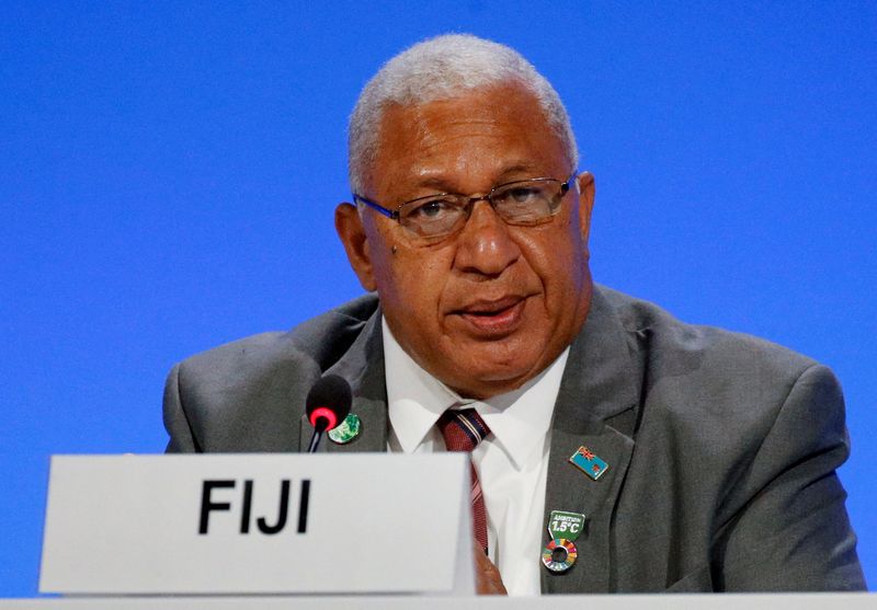 &copy; Reuters. FILE PHOTO: Fiji's former Prime Minister Josaia Voreqe 'Frank' Bainimarama attends a meeting during the UN Climate Change Conference (COP26) in Glasgow, Scotland, Britain, November 2, 2021. REUTERS/Phil Noble/Pool/File Photo