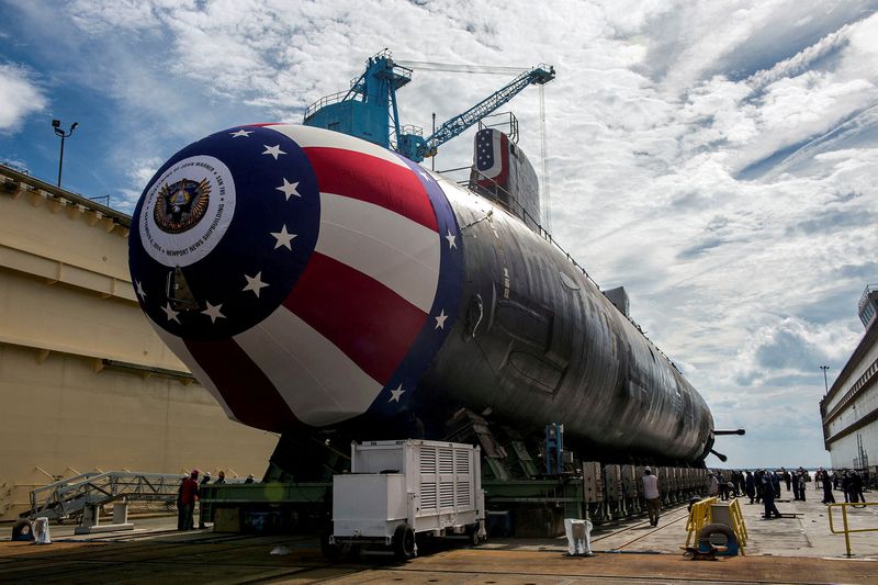 &copy; Reuters. FILE PHOTO: The Virginia-class attack submarine Pre-commissioning Unit (PCU) John Warner (SSN 785) is moved to Newport News Shipbuilding's floating dry dock in preparation for the September 6 christening in Newport News, Virginia, U.S. August 31, 2014.   