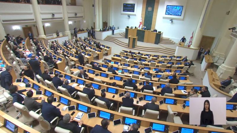 &copy; Reuters. Lawmakers attend a plenary session of parliament where they vote on controversial 'foreign agents' bill that sparked mass protests in recent days, in Tbilisi, Georgia March 10, 2023, in this still image taken from video. Parliament of Georgia/Handout via 