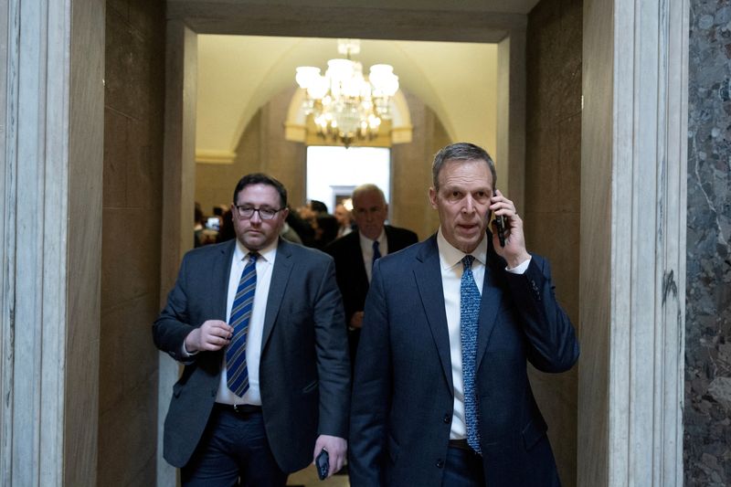 &copy; Reuters. FILE PHOTO: U.S. Rep. Scott Perry (R-PA) uses a cell phone while walking to the House Chamber on Capitol Hill in Washington, U.S., February 2, 2023. REUTERS/Tom Brenner