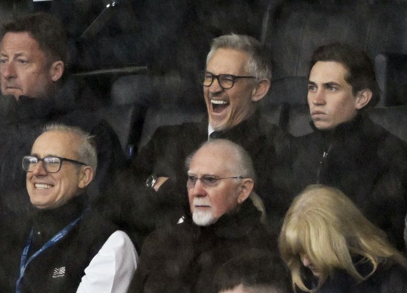 © Reuters. Former player and TV presenter Gary Lineker is pictured in the stand with his son. Leicester City v Chelsea, March 11, 2023. REUTERS/Toby Melville