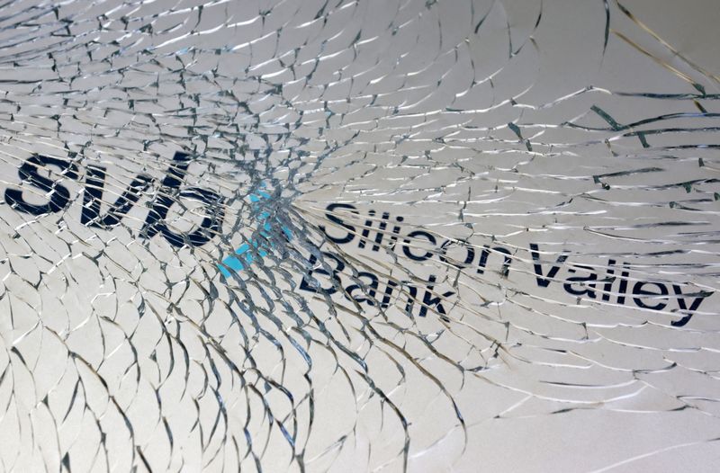 © Reuters. FILE PHOTO: SVB (Silicon Valley Bank) logo is seen through broken glass in this illustration taken March 10, 2023. REUTERS/Dado Ruvic/Illustration/File Photo