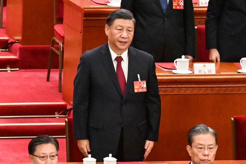 &copy; Reuters. China's President Xi Jinping sings the national anthem during the closing session of the National People's Congress (NPC) at the Great Hall of the People in Beijing on March 13, 2023.     NOEL CELIS/Pool via REUTERS