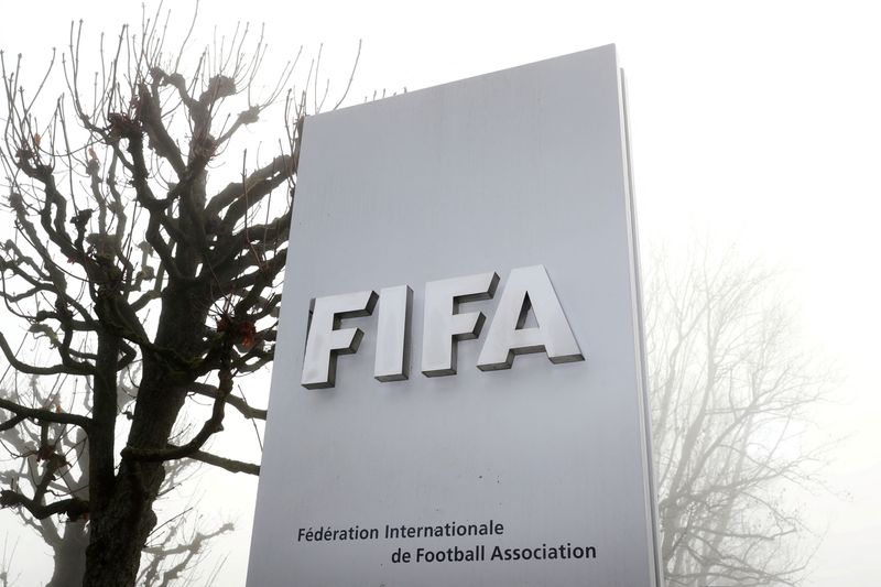 &copy; Reuters. FILE PHOTO: FIFA's logo is seen in front of its headquarters during a foggy autumn day in Zurich, Switzerland November 18, 2020. REUTERS/Arnd Wiegmann