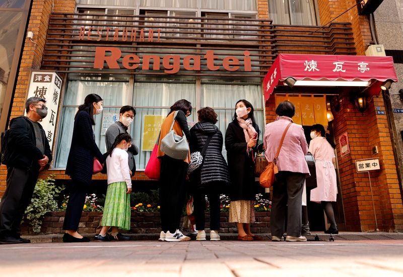 &copy; Reuters. People form a line as they try to have lunch at Rengatei, a popular and long-established restaurant specialising in Japanese-style Western dishes, at Ginza district in Tokyo, Japan March 16, 2023.  REUTERS/Issei Kato