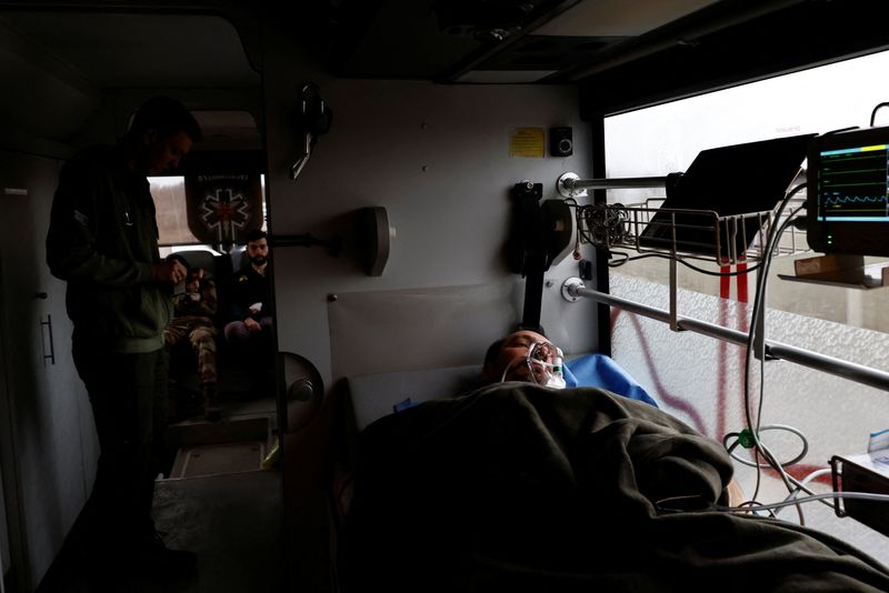 'We live in hell': Volunteer bus evacuates wounded Ukrainian troops