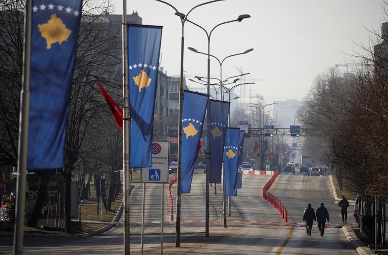 &copy; Reuters. FILE PHOTO: Kosovar flags hang from lampposts on the day of celebrations of the 15th anniversary of Kosovo independence in Pristina, Kosovo, February 17, 2023. REUTERS/Florion Goga