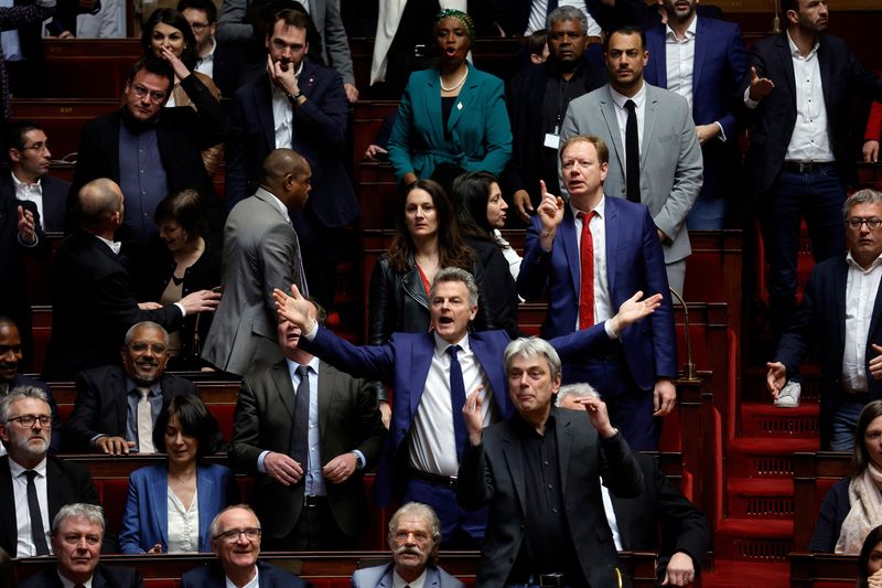 © Reuters. Member of Parliament Fabien Roussel, French Communist Party (PCF) National Secretary, gestures before French Prime Minister Elisabeth Borne delivers a speech to announce the use of the article 49.3, a special clause in the French Constitution, to push the pensions reform bill through the lower house of parliament without a vote by lawmakers, at the National Assembly in Paris, France, March 16, 2023. REUTERS/Pascal Rossignol