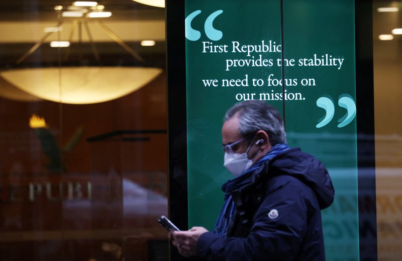 &copy; Reuters. A person walks past a First Republic Bank branch in Midtown Manhattan in New York City, New York, U.S., March 13, 2023. REUTERS/Mike Segar