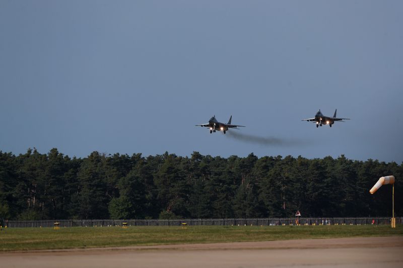 &copy; Reuters. Russian-made MiG-29 fighter jets fly near the Malacky Air Base, near Malacky, Slovakia, August 27, 2022. REUTERS/David W Cerny/File Photo
