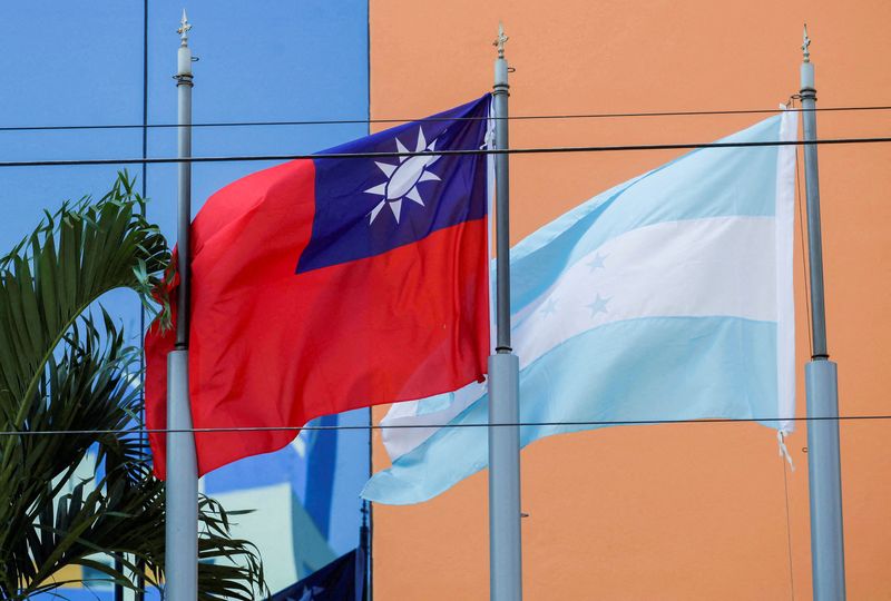 &copy; Reuters. FILE PHOTO: The flags of Taiwan and Honduras flutter in the wind outside the Taiwan Embassy in Tegucigalpa, Honduras March 15, 2023. REUTERS/Fredy Rodriguez/File Photo