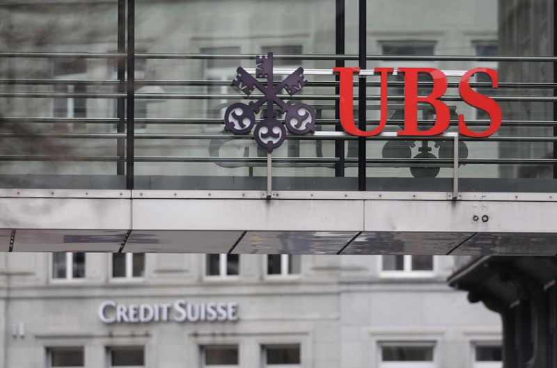 &copy; Reuters. Logos of Swiss banks UBS and Credit Suisse are seen in Zurich, Switzerland March 19, 2023. REUTERS/Moritz Hager