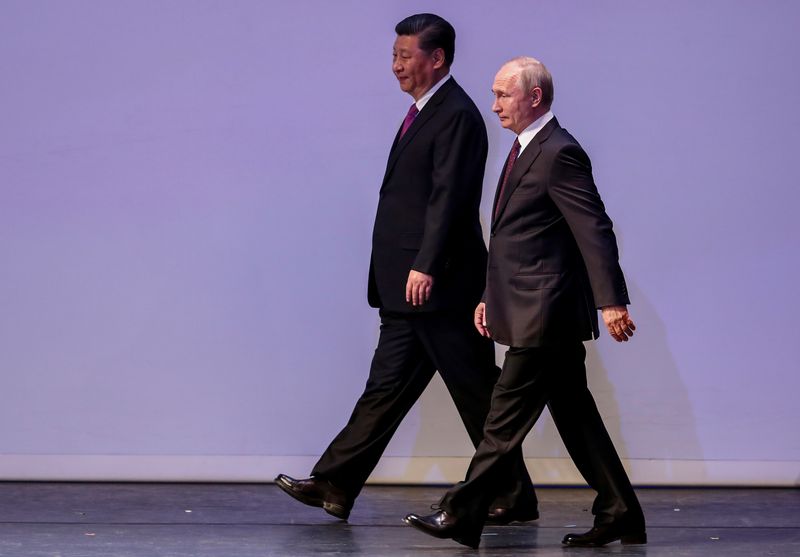 &copy; Reuters. FILE PHOTO: Chinese President Xi Jinping and Russian President Vladimir Putin attend a ceremony dedicated to the 70th anniversary of the establishment of diplomatic relations between Russia and China, in Bolshoi Theatre in Moscow, Russia June 5, 2019. Ser