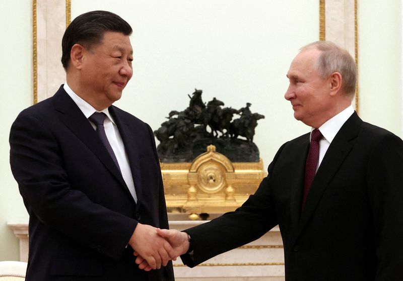 &copy; Reuters. Presidente russo, Vladimir Putin, recebe o líder chinês, Xi Jinping, em Moscou
20/03/2023
Sputnik/Sergei Karpukhin/Pool via REUTERS