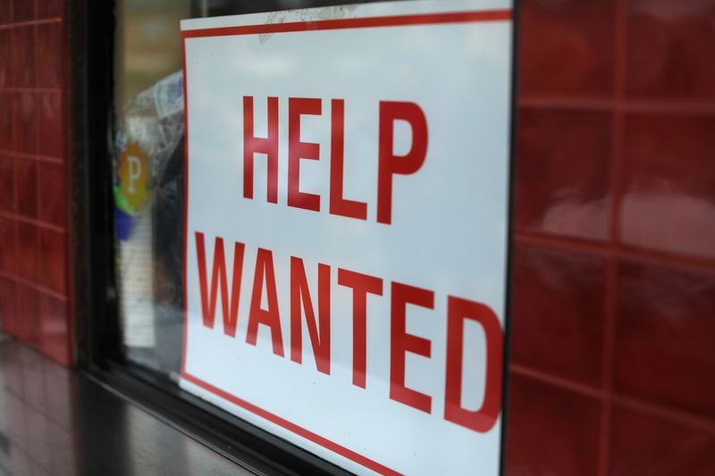 © Reuters. FILE PHOTO: A help wanted sign is posted at a taco stand in Solana Beach, California, U.S., July 17, 2017.   REUTERS/Mike Blake