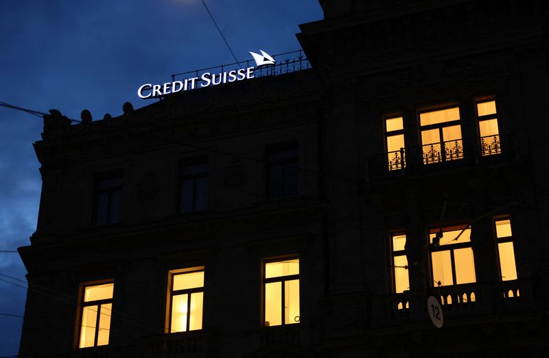 © Reuters. A logo of Credit Suisse is seen on the Credit Suisse headquarter as people demonstrate against the buying of Swiss bank Credit Suisse by UBS in Zurich, Switzerland March 20, 2023. REUTERS/Denis Balibouse