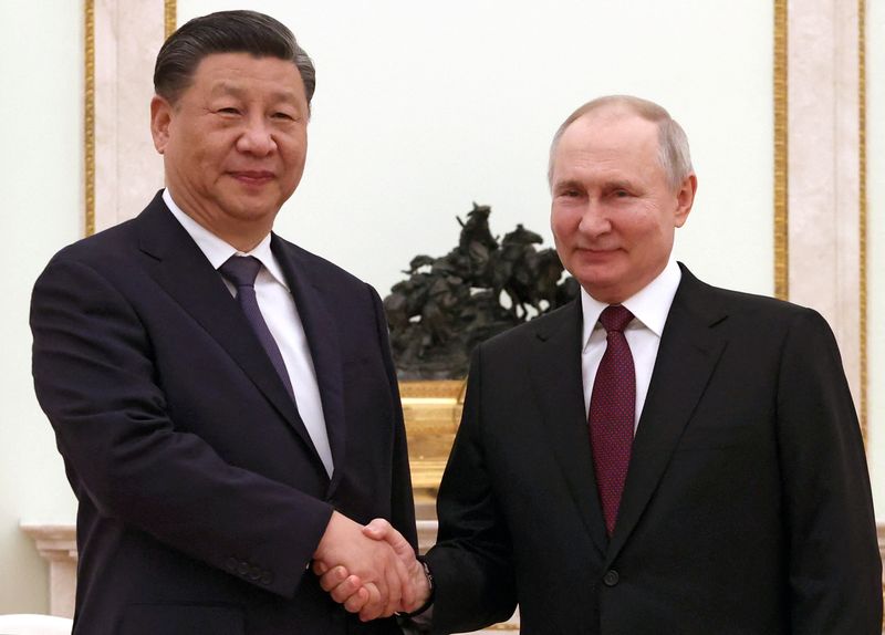&copy; Reuters. Il presidente cinese Xi Jinping e il presidente russo Vladimir Putin . Sputnik/Sergei Karpukhin/Pool via REUTERS