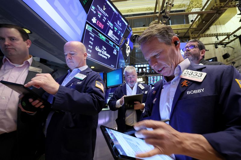 Wall Street ends green on bank bounce as Fed takes focus