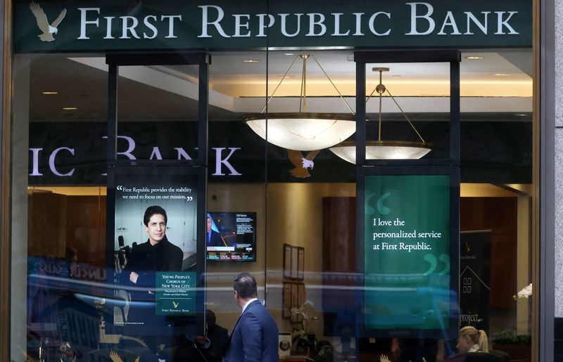 &copy; Reuters. FILE PHOTO: A person walks past the First Republic Bank branch in Midtown Manhattan in New York City, New York, U.S., March 13, 2023. REUTERS/Mike Segar