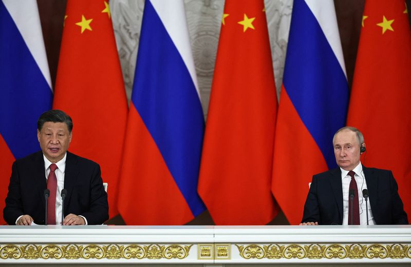 &copy; Reuters. Russian President Vladimir Putin and Chinese President Xi Jinping attend a joint statement following their talks at the Kremlin in Moscow, Russia March 21, 2023. Sputnik/Mikhail Tereshchenko/Pool via REUTERS