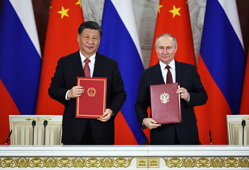 プーチン氏、中国の仲裁案「解決の基礎」　中ロ戦略協力強化で合意