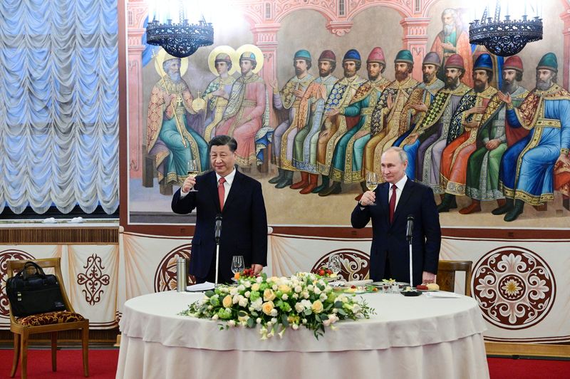 &copy; Reuters. Putin e Xi fazem um brinde em recepção durante visita do presidente chinês a Moscou
21/03/2023
Sputnik/Pavel Byrkin/Kremlin via REUTERS