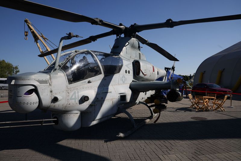 &copy; Reuters. A Bell helicopter Ah-1Z Viper helicopter is seen outside a hall at the 30th International Defence Industry Exhibition in Kielce, Poland September 5, 2022. REUTERS/Kacper Pempel