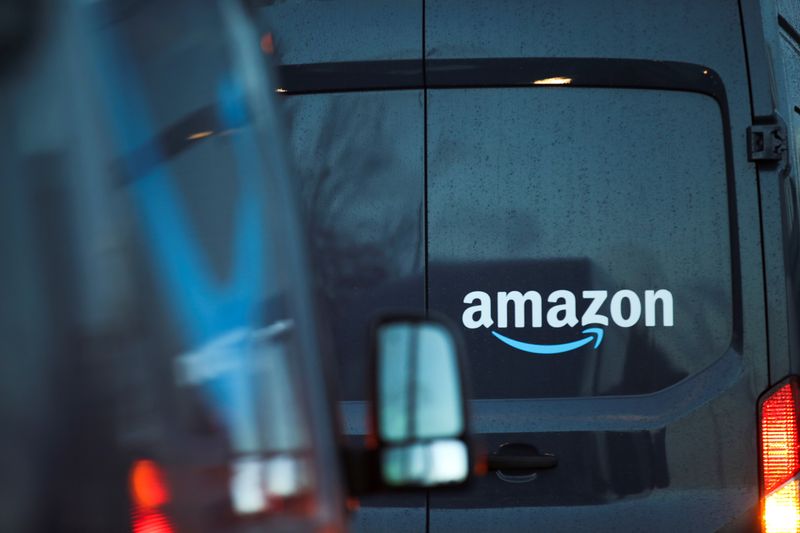 &copy; Reuters. FILE PHOTO: A logo of Amazon is pictured on a vehicle as Extinction Rebellion activists protest outside the Amazon Fulfilment Centre in Altrincham, near Manchester, Britain, November 26, 2021. REUTERS/Carl Recine