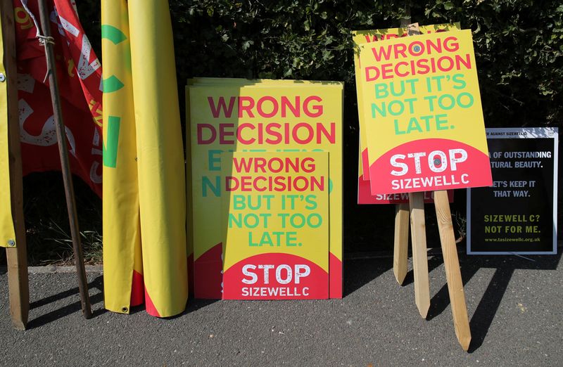 &copy; Reuters. FILE PHOTO: Banners belonging to demonstrators protesting against EDF's proposed Sizewell C nuclear power station, are pictured ahead of a visit by British Prime Minister Boris Johnson to Sizewell B Nuclear power station, in Sizewell, Britain September 1,