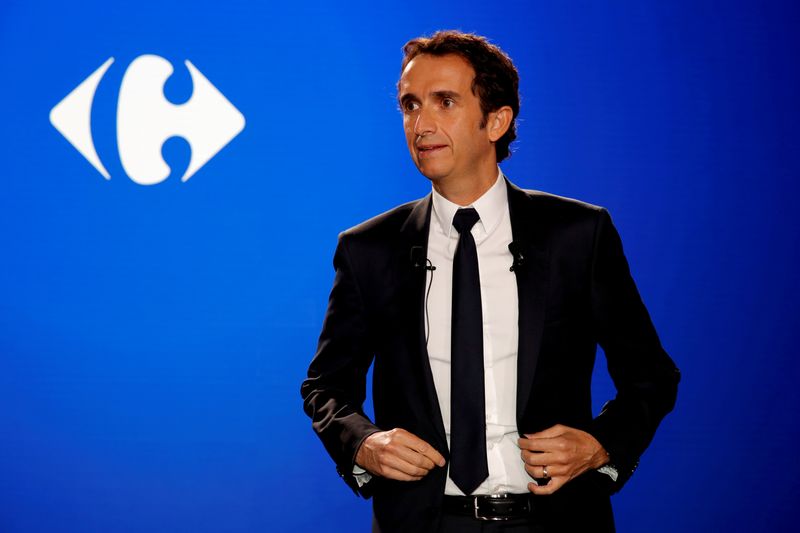 &copy; Reuters. FILE PHOTO: Alexandre Bompard, Chief Executive Officer of French retailer Carrefour, poses before a news conference to present the company's strategic plan in La Defense, near Paris, France, January 23, 2018. REUTERS/Philippe Wojazer