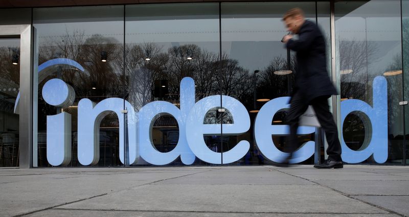 &copy; Reuters. FILE PHOTO: A man walks past the offices of Indeed in the centre of Dublin, Ireland, February 10, 2020. REUTERS/Phil Noble