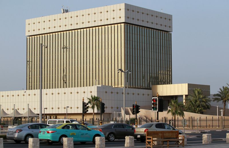 &copy; Reuters. FILE PHOTO: Cars drive past the building of Qatar Central Bank in Doha, Qatar, June 6, 2017. REUTERS/Naseem Zeitoon