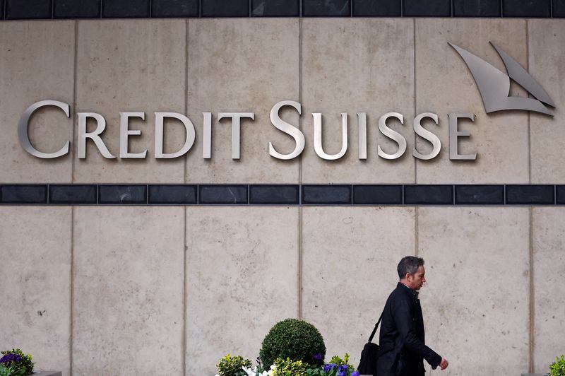 &copy; Reuters. FILE PHOTO: A person walks past the Credit Suisse office in Canary Wharf in London, Britain, March 20, 2023. REUTERS/Hannah McKay/File Photo