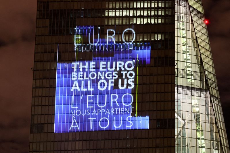 &copy; Reuters. FILE PHOTO: A symphony of light illuminates the south facade of the European Central Bank (ECB) headquarters in Frankfurt, Germany, December 30, 2021.   REUTERS/Wolfgang Rattay/File Photo