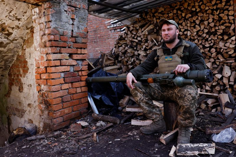 &copy; Reuters. Anti-aircraft unit serviceman of the 10th Mountain Assault Brigade, call sign "Chub", 34, poses for a portrait with a portable anti-aircraft missile system, amid Russia's attack on Ukraine, near Soledar north of Bakhmut, Ukraine March 23, 2023. REUTERS/Vi