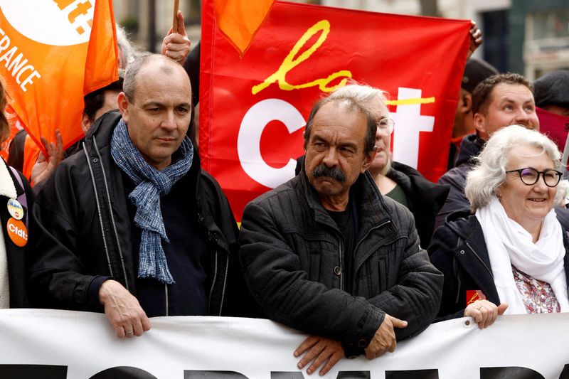 &copy; Reuters. Laurent Berger, secretary general of French Democratic Confederation of Labour (CFDT) and CGT labour union leader Philippe Martinez attend a demonstration as part of the ninth day of nationwide strikes and protests against French government's pension refo