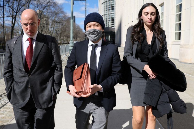 &copy; Reuters. FILE PHOTO: Ex-Goldman Sachs banker Roger Ng exits the Brooklyn Federal Courthouse (EDNY) after being sentenced for his part helping embezzle from Malaysia's 1MDB sovereign wealth fund, in Brooklyn, New York, U.S., March 9, 2023.  REUTERS/Brendan McDermid