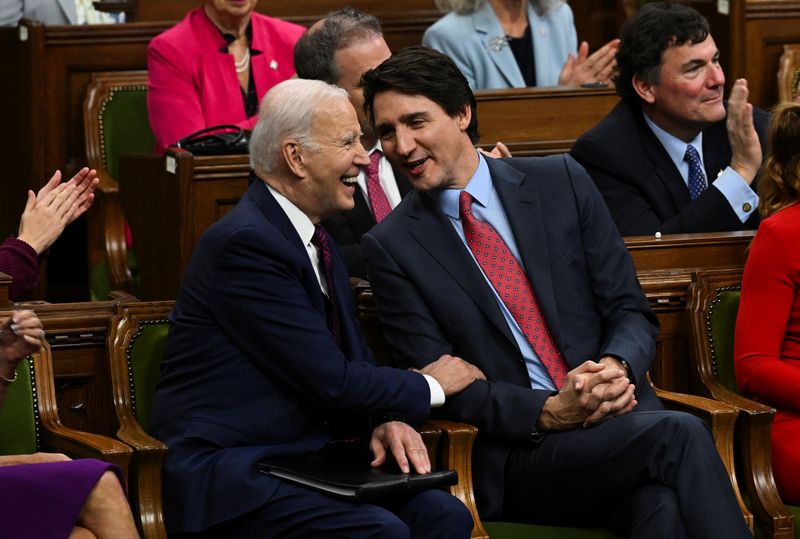 &copy; Reuters. U.S. President Joe Biden and Canadian Prime Minister Justin Trudeau speak as they attend an address to the Canadian Parliament, in Ottawa, Canada, Mach 24, 2023. Kenny Holston/Pool via REUTERS