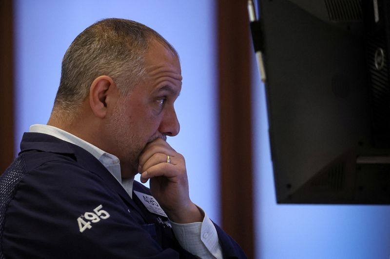 &copy; Reuters. A trader works on the floor of the New York Stock Exchange (NYSE) in New York City, U.S., March 22, 2023.  REUTERS/Brendan McDermid