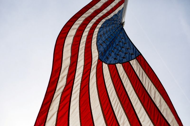 &copy; Reuters. An American flag blows in the wind in Hillsdale, Michigan, U.S., February 8, 2023. REUTERS/Emily Elconin 