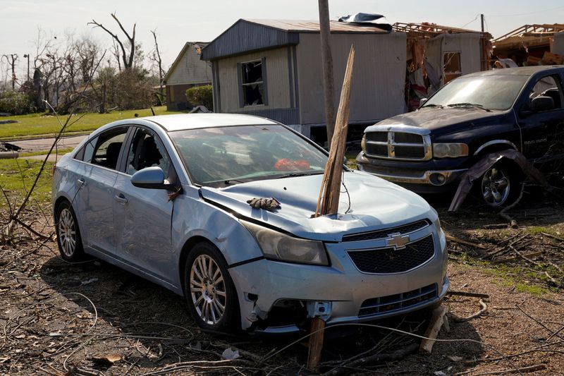 &copy; Reuters. A vehicle is seen impaled by a piece of wood after thunderstorms spawning high straight-line winds and tornadoes ripped across the state, in Rolling Fork, Mississippi, U.S. March 26, 2023.  REUTERS/Cheney Orr