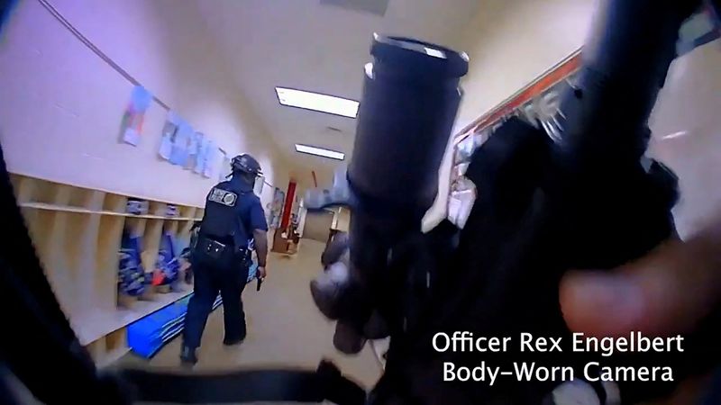 &copy; Reuters. Metropolitan Nashville Police Department officers search for the mass shooting suspect in The Covenenant School, in a still image from body camera video in Nashville, Tennessee, U.S. March 27, 2023.  Metropolitan Nashville Police Department/Handout via RE