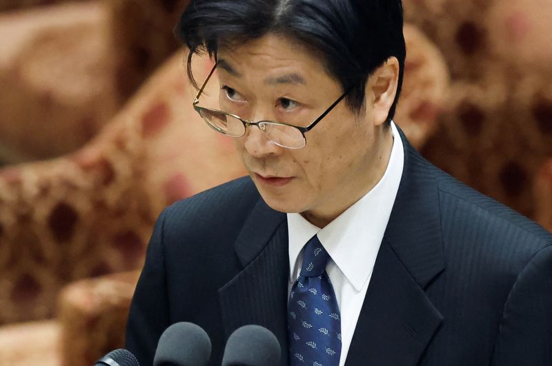 © Reuters. FILE PHOTO: The Japanese government's nominee for the Bank of Japan (BOJ) Deputy Governor Shinichi Uchida speaks during a hearing session at the lower house of the parliament in Tokyo, Japan, February 24, 2023.  REUTERS/Issei Kato