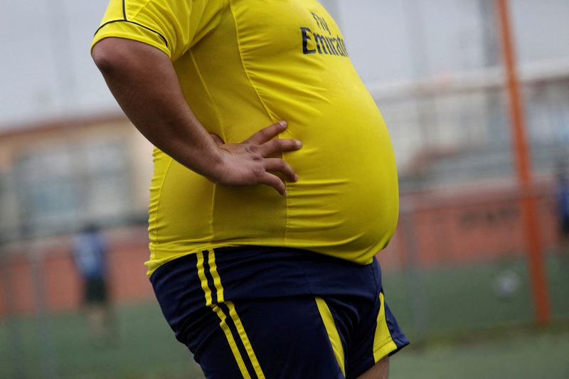 &copy; Reuters. FILE PHOTO: A player is pictured during his "Futbol de Peso" (Soccer of Weight ) league soccer match, a league for obese men who want to improve their health through soccer and nutritional counseling, in San Nicolas de los Garza, Mexico, September 16, 201