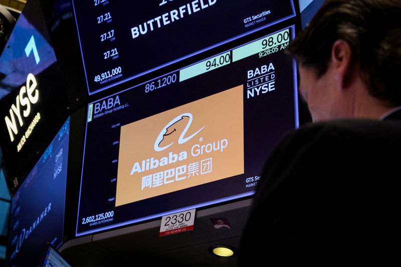 &copy; Reuters. FILE PHOTO: Trader works at the post where Alibaba is traded on the floor of the New York Stock Exchange (NYSE) in New York City, U.S., March 28, 2023.  REUTERS/Brendan McDermid