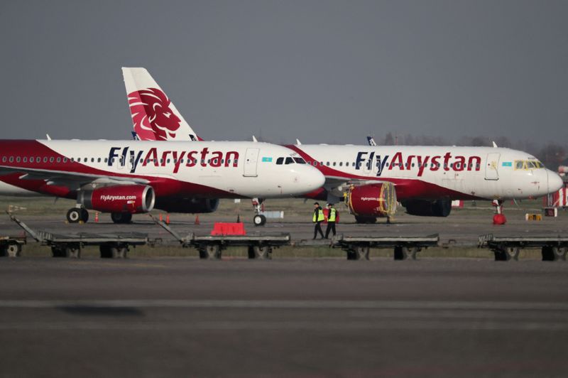 © Reuters. A view shows FlyArystan planes at Almaty International Airport, in Almaty, Kazakhstan March 28, 2023. REUTERS/Pavel Mikheyev