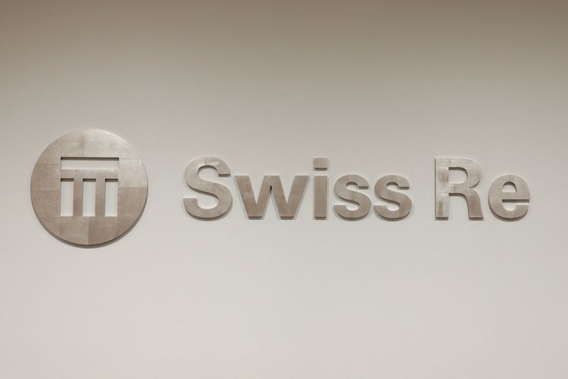 &copy; Reuters. FILE PHOTO: The logo of the world's second largest reinsurer Swiss Re is seen inside the company's offices in Zurich, Switzerland, February 23, 2018. REUTERS/Moritz Hager