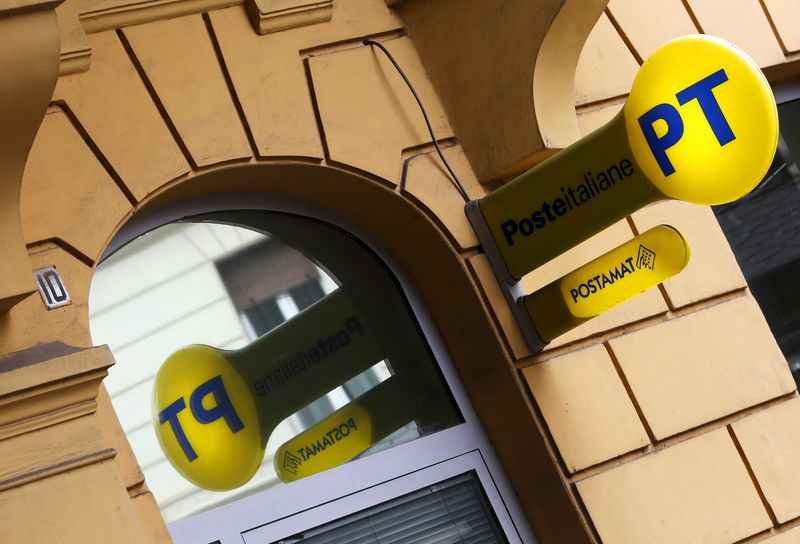 &copy; Reuters. FILE PHOTO: A signboard of Poste Italiane is seen hanging outside a post office in central Rome, Italy, October 9, 2015. REUTERS/Alessandro Bianchi