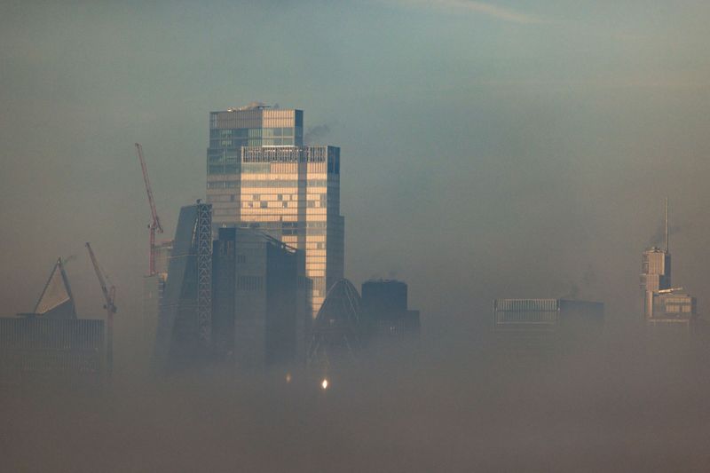 &copy; Reuters. Buildings in the city financial district are seen through fog from Canary Wharf in London, Britain, February 8, 2023. REUTERS/Kevin Coombs