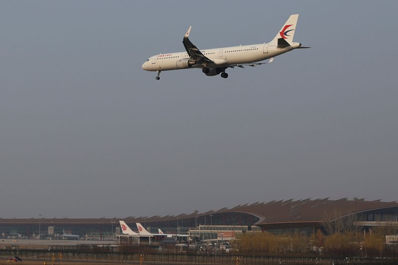 &copy; Reuters. FILE PHOTO: A plane of China Eastern Airlines lands at the Beijing Capital International Airport in Beijing, China March 23, 2022. REUTERS/Tingshu Wang